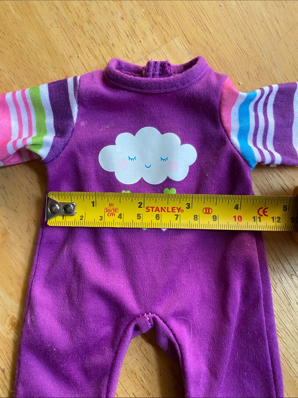 The purple baby doll romper from the My Sweet Love Baby Doll and Outfits Play Se - Picture 2 of 4
